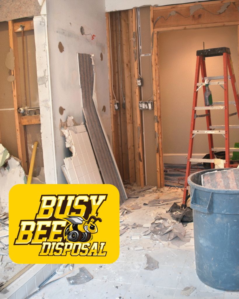 demolition project with Busy Bee Disposal logo