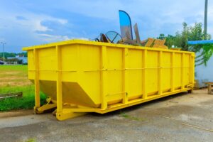yellow roll-off dumpster
