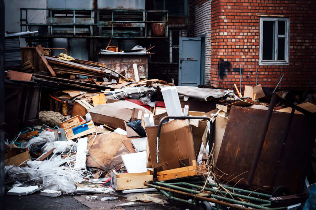 Junk and debris outside of building