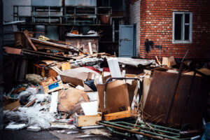 Junk and debris outside of building